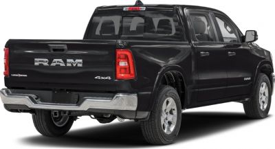Rear side of black pickup truck with 4x4 drive and chrome bumper