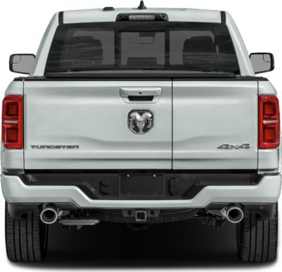 Rear view of pickup with dual exhaust and 4x4 badge