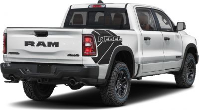 Rear view of pickup with Rebel decal and off-road tires