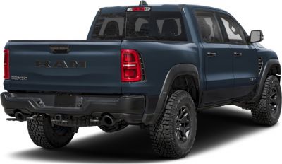 Rear and side view of pickup with rugged tires and modern tail lights