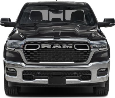 Front view of a pickup truck with bold grille and headlights