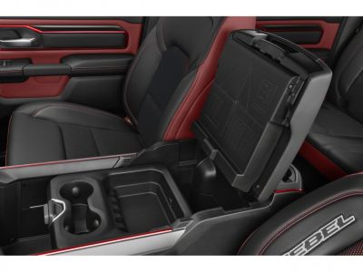 Center console storage with cup holders and detailed red-accented leather interior
