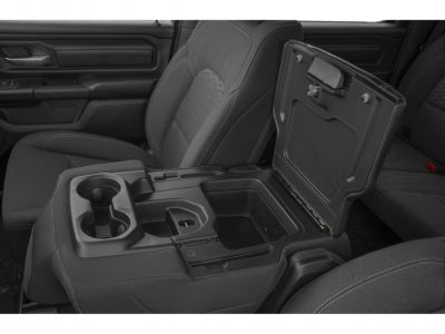 Open center console storage with integrated cup holders in vehicle interior