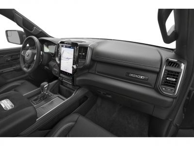Vertical touchscreen and premium black leather interior with RAM RHO branding