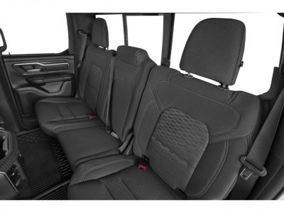 Rear seat upholstery and interior design of a pickup truck.