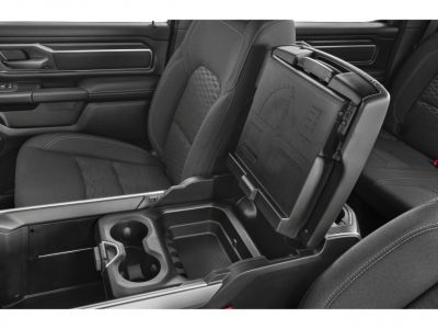 Interior storage console and seat design with cup holders.