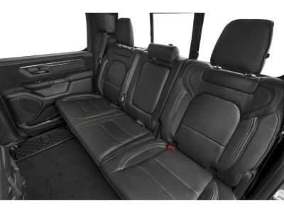 Black leather rear seats and door panel with stitching details