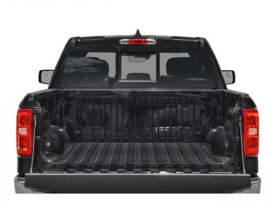 Open black truck bed with ribbed cargo area and tailgate down