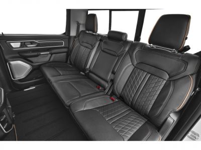 Black leather rear seats with diamond stitching and premium trim.