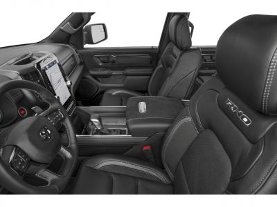 Black leather seats and touchscreen console with navigation