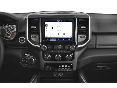 Modern dashboard with touchscreen, 4WD selector, and climate controls