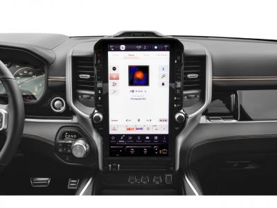 Large vertical touchscreen infotainment system and modern dashboard controls