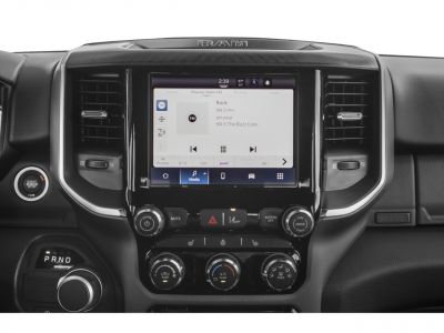 Digital infotainment and climate control center with touchscreen.