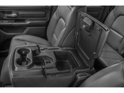Spacious center console storage with cup holders and secure compartment