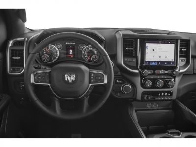 Dashboard with instrument cluster, infotainment touchscreen, and steering wheel controls