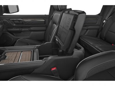Adjustable front seats and center console storage with wood trim