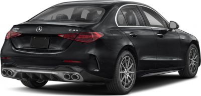 Rear view of a sporty sedan with quad exhaust pipes and sleek tail lights