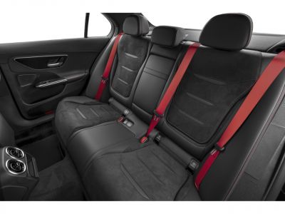 Rear black suede seats with red seatbelts and headrests