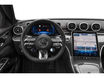 AMG steering wheel with digital instrument cluster and large infotainment touchscreen