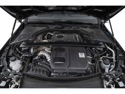 AMG engine bay with turbo components in a luxury sedan