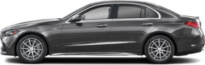Side profile of a sedan with alloy wheels and aerodynamic lines.