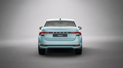 Rear view of a facelifted compact sedan with LED taillights and modern bumper design.