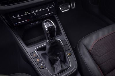 Automatic gear shifter with digital climate control panel and heated seat buttons