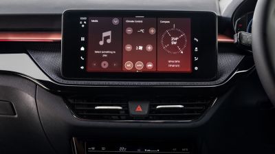Modern infotainment display with climate control and digital compass