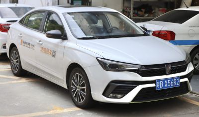 Aerodynamic front and side profile with sharp headlights and grille