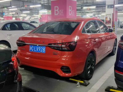 Rear view of sedan with distinctive sleek taillights and integrated rear bumper design