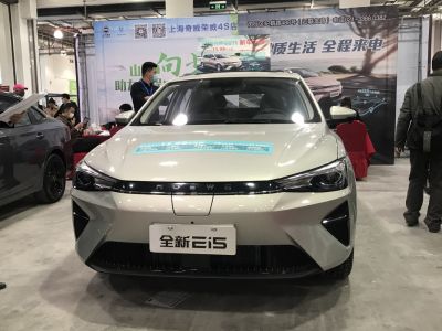Front view with modern headlights and grille design
