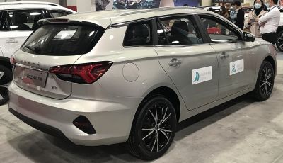 Rear-side view with sleek tail lights and alloy wheels