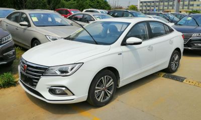Front side view of a mid-size sedan with alloy wheels