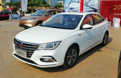 Front and side view of a modern sedan with sharp headlights and alloy wheels