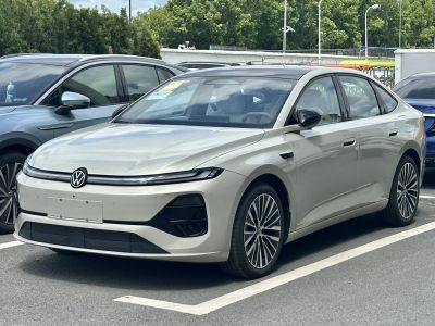 Sleek aerodynamic front with LED headlights and modern wheels