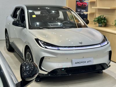 Front view with sleek LED headlights and aerodynamic design