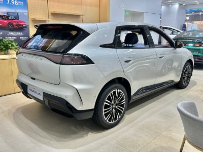 Rear and side view of a sleek hatchback with distinct taillights and modern wheels