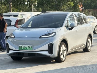Electric MPV with narrow LED headlights and distinctive aerodynamic wheels