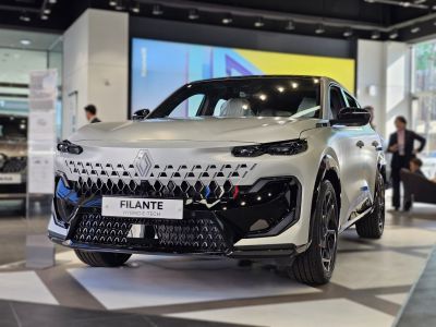 Futuristic front grille and sleek headlights in showroom setting