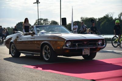 Vintage 1971 convertible with sleek open-top design and classic muscle car front.
