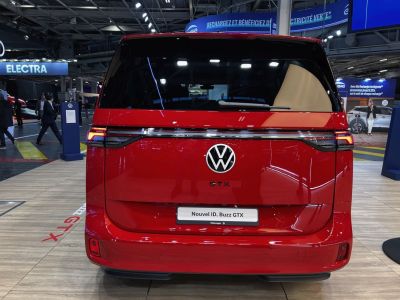 Rear view with large window, horizontal LED taillights, and GTX badge