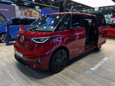 Futuristic electric van with LED headlights and sliding door