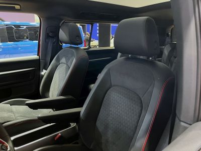 Front seats with armrests and detailed upholstery in modern electric vehicle interior