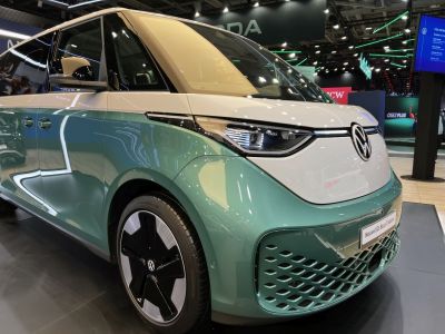 Front LED headlight and futuristic wheel with two-tone green-white body