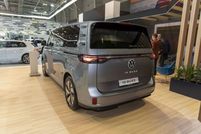 Rear view of electric minivan with LED taillights and tinted windows