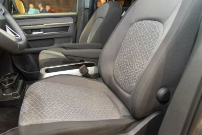 Front seats with patterned upholstery and armrests