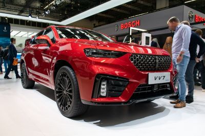 SUV front view with sporty grille, LED headlights, and black alloy wheels