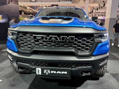 Close-up of aggressive front grille and hood scoop.