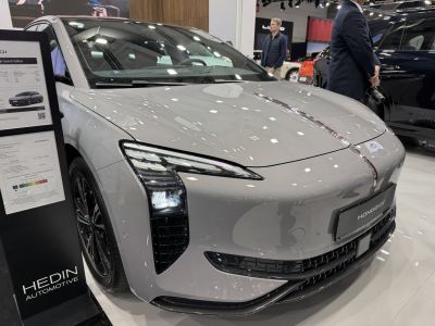 Sleek aerodynamic front with futuristic LED headlights