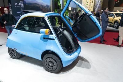 Compact light blue micro EV with unique front-opening door